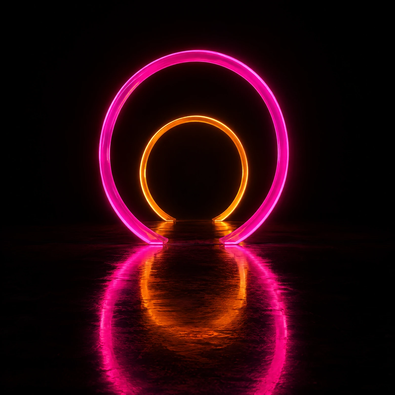 Large glowing hot pink neon ring gate with a smaller amber ring behind it on a glossy black reflective floor